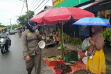 Satpol PP turunkan seluruh personel sosialisasikan Perwako tentang pola hidup baru