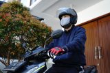 Tips aman mengendarai motor di era kenormalan baru