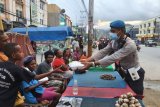 Polresta Jayapura Kota salurkan makanan siap saji
