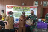 Kodim Mimika berikan bantuan bahan pokok masyarakat Kampung Kamoro