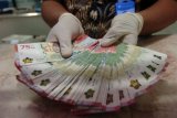 Penukaran uang baru pecahan Rp75.000