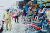 Polri-TNI Mimika imbau warga Wania waspada malaria dan COVID-19