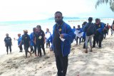 Mahasiswa PPKN Uncen Jayapura bersihkan coretan vandalisme