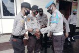 Polres Merauke bagikan 150 masker ke personel cegah corona