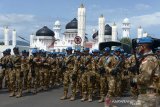 Prajurit dari Satuan Tugas Kompi Zeni TNI Kontingen Garuda (Konga) XXXVII-F Multi Dimensional Integrated Stabilization Mission in Central Afrika Republic (Minusca CAR) saat tiba di Banda Aceh, Aceh, Jumat (16/10/2020). Satgas Kompi Zeni TNI Konga XXXVII-F Minusca CAR berjumlah 200 personil dari TNI AD-TNI AL dan TNI AU itu tiba di tanah air setelah selama setahun bertugas bersama pasukan PBB dalam misi perdamaian di Kongo, Afrika Tengah. Antara Aceh/Ampelsa