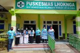 Garuda Indonesia menyerahkan 5000 masker kepada masyarakat di Puskesmas Lhoknga, Aceh Besar, Kamis, (19/11/2020). Masker tersebut disalurkan PT. Garuda Indonesia bersinergi PT. Pupuk Iskandar Muda selaku PIC Satgas BUMN Provinsi Aceh dan beberapa BUMN PIC Kabupaten Kota di Aceh. Antara Aceh/PT. Garuda Indonesia.