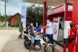 Pertashop Pertamina berbagi promo kepada konsumen Lampung