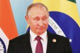 Putin bakal disuntik vaksin Rusia Sputnik V