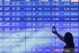IHSG Selasa menguat 28,93 poin, rupiah turun jadi 14.273