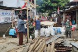 Kodam XIII Merdeka karya bakti pemulihan pascabanjir