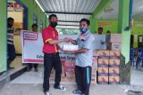 Uang Receh Konsumen untuk Korban Banjir Lombok