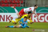 Cologne disingkirkan klub strata kedua dari Piala Jerman setelah kalah adu penalti 3-4