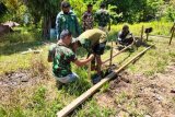 Warga distrik Kawagit antusias bantu pembangunan rumah TMMD
