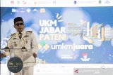 GERNAS BANGGA BUATAN INDONESIA JABAR. Gubernur Jawa Barat Ridwan Kamil menyampaikan pidato pembuka saat peresmian kampanye Gerakan Indonesia Bersama UMKM dan ajang Gernas Bangga Buatan Indonesia di Bandung, Jawa Barat, Sabtu (3/4/2021). Kampanye Gernas Bangga Buatan Indonesia (BBI) yang berlangsung pada bulan April 2021 di Jawa Barat ini mengangkat tema UKM Jabar Paten. ANTARA JABAR/M Agung Rajasa/agr