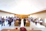 BPJAMSOSTEK bersama Pemprov Sulut serahkan santunan kematian ke 30 ahli waris