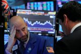 Wall Street ditutup beragam