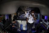 Penerapan protokol kesehatan di bus