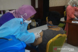 Indonesia pushes vaccination drive further in COVID-19 fight the second tsunami wave