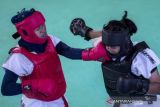 Pertarungan Atlet Sumbar Pada Semi Final Tarung Derajat 54,1-58 Kg  PON Papua