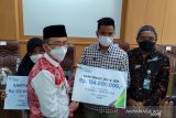 BPJAMSOSTEK Cikarang santuni penjaga sekolah dan petugas kebersihan