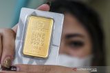 Emas naik tipis di Asia