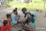 Satgas Yonif 711 melayani kesehatan gratis warga perbatasan RI-PNG
