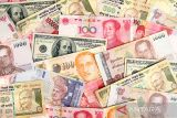 Mata uang Asia sebagian besar naik tipis, karena investor berhati-hati