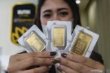 Harga emas turun Rp1,884 juta/gram dari Rp1.907 juta