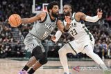 Kyrie Irving antarkan Nets jinakkan Bucks 126-123