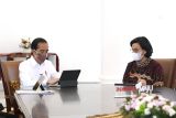 Presiden Jokowi melaporkan SPT Pajak Tahun 2021 melalui 