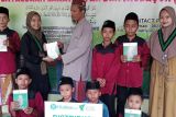 Kitabisa.com-Dompet Dhuafa Lampung dan HMI sedekah Al Quran di Lampung Timur