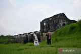 Dam bersejarah peninggalan kolonial Belanda di Desa Turipinggir, Kecamatan Megaluh, Kabupateb Jombang, Jawa Timur, Sabtu (28/5/2022). Bendungan Saluran Induk Tunggorono dibangun pada tahun 1926 masa kolonial Belanda tersebut saat ini menjadi salah satu pilihan spot foto para remaja. Antara Jatim/Syaiful Arif/zk