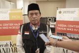 Jamaah calon haji Indonesia pakai masker