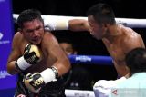 Daud Yordan pertahankan gelar setelah menang TKO atas petinju Thailand Panya Uthok