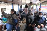 Fasilitas bus wisata tersebut gratis bagi wisatawan untuk berkeliling di Kota Malang.