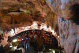 Petugas melakukan peninjauan lapangan untuk memeriksa legalitas bangunan Restoran The Cave di kawasan Pecatu, Badung, Bali, Selasa (19/7/2022). Restoran unik yang terletak di dalam gua itu dihentikan operasionalnya sementara karena belum melengkapi izin dan sedang menunggu kajian dari sejumlah instansi terkait pemanfaatan gua tersebut sebagai restoran. ANTARA FOTO/Fikri Yusuf/nym.