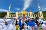 Kagumi Islamic Center, jemaah BKMT luar daerah Wefie di monumen Alquran