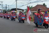 Para peserta Karnaval Kendaraan Hias Pembangunan Provinsi Kepulauan Bangka Belitung, dalam rangka memperingati Hari Ulang Tahun (HUT) ke-77 Kemerdekaan Republik Indonesia di Kota Pangkalpinang, Senin (22/8).
