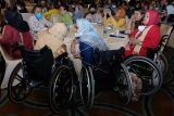 Sejumlah penyandang disabilitas menghadiri pembukaan Konferensi Tingkat Tinggi (KTT) Civil 20 (C20) Summit 2022 di Nusa Dua, Badung, Bali, Rabu (5/10/2022). KTT C20 yang digelar pada 5-7 Oktober 2022 dengan dihadiri sekitar 500 peserta yang mewakili anggota C20 dan organisasi masyarakat sipil dari seluruh dunia tersebut membahas isu-isu strategis dari tujuh working group C20. ANTARA FOTO/Nyoman Hendra Wibowo/nym.