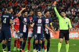 Sepuluh pemain PSG selamatkan satu poin di Reims