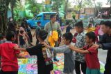 Permainan anak hidup sehat di kampung Pandai TPA Sukawinatan Palembang