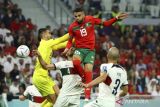 Pemain timnas Maroko Youssef En-Nesyri (19) mencetak gol ke gawang Portugal pada pertandingan babak perempat final Piala Dunia Qatar 2022 di Stadion Al Thumama, Doha, Qatar, Sabtu (10/12/2022). Skor sementara hingga menit ke-60, Maroko memimpin 1-0 atas Portugal. ANTARA FOTO/REUTERS/Molly Darlington/wsj.