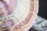 Rupiah awal pekan dibuka melemah