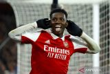 Pesepak bola Arsenal Eddie Nketiah berselebrasi usai mencetak gol ke gawang Manchester United pada pertandingan pekan ke-21 Liga Premier di Stadion Emirates, London, Inggris, Minggu (22/1/2023). Arsenal meraih kemenangan dramatis 3-2 atas Manchester United. ANTARA FOTO/Action Images/Peter Cziborra/via REUTERS/wsj.