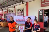 Peduli Korban Banjir di Manado, Alfamidi Salurkan Paket Bantuan Kebutuhan Pokok