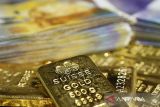 Emas tergelincir tertekan dolar AS yang lebih kuat