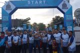 Ribuan kaum milenial dan masyarakat Kota Pangkalpinang Provinsi Kepulauan Bangka Belitung mengikuti Jalan Sehat Bersama BUMN, dalam memeringati HUT ke-25 Tahun Kementerian BUMN.  (ANTARA FOTO/ Aprionis)