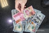 Rupiah meningkat seiring pasar nantikan pidato Ketua The Fed