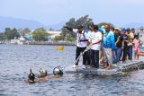 Peserta renang bersiap beradu kecepatan saat mengikuti lomba renang Open Water Swimming dalam Sabang Marine Festival 2023 di Teluk Kota Sabang, Aceh, Sabtu (18/3/2023).  Antara Aceh/Khalis Surry
