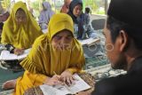 Belajar Membaca Al Quran Untuk Warga Lanjut Usia